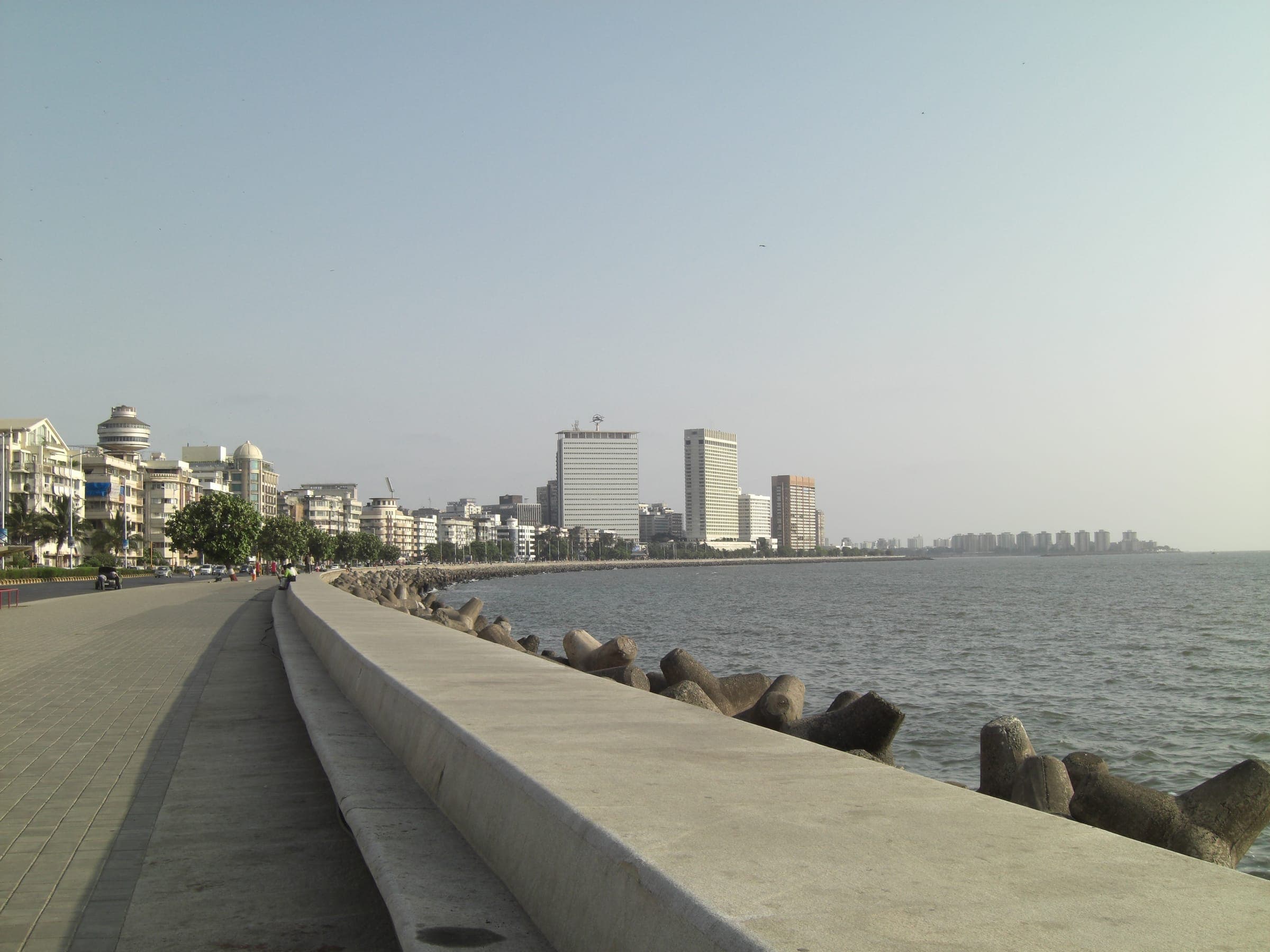 The Marine Drive promenade and its tetrapods curving toward Nariman Point on a clear day